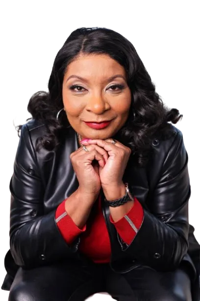 Dr. Melanie Gray smiling with her hands under her chin
